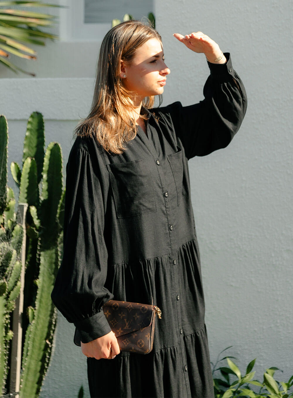 The Daisy Linen Midi Dress in black is made from 100% linen, It's overised layers drape over the body flowing effortlessly.