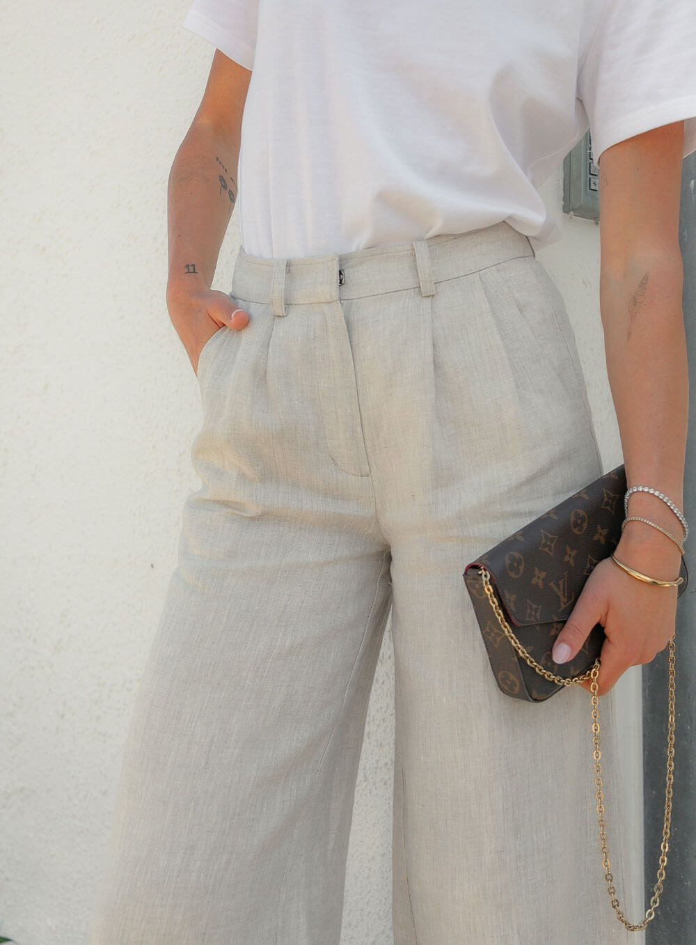 Edith Linen Culottes in beige is 100% Linen with elastic waistband at back, only slightly cropped, button and zip enclosure at front and 2 side pockets