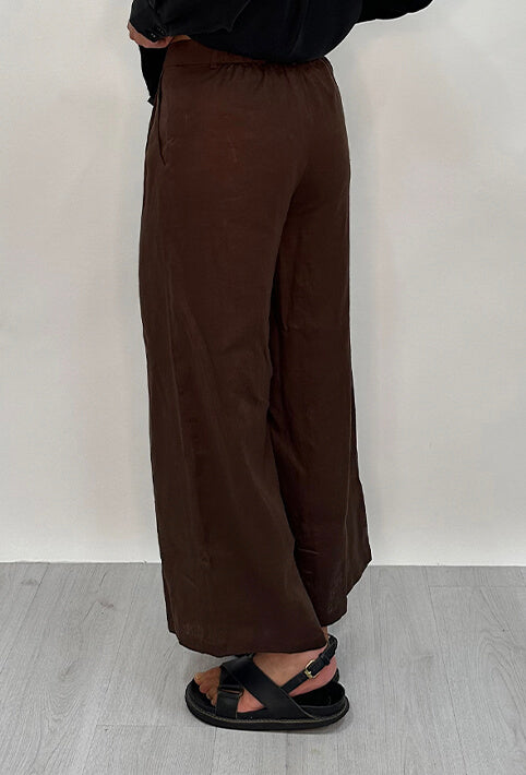 Edith Linen Culottes in chocolate is 100% Linen with elastic waistband at back, only slightly cropped, button and zip enclosure at front and 2 side pockets