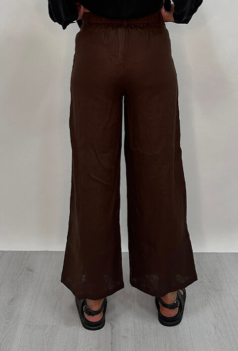 Edith Linen Culottes in chocolate is 100% Linen with elastic waistband at back, only slightly cropped, button and zip enclosure at front and 2 side pockets