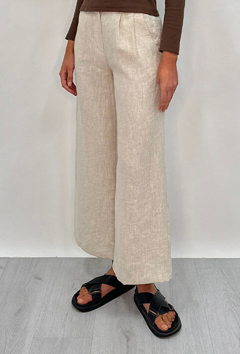 Edith Linen Culottes in beige is 100% Linen with elastic waistband at back, only slightly cropped,  button and zip enclosure at front and 2 side pockets