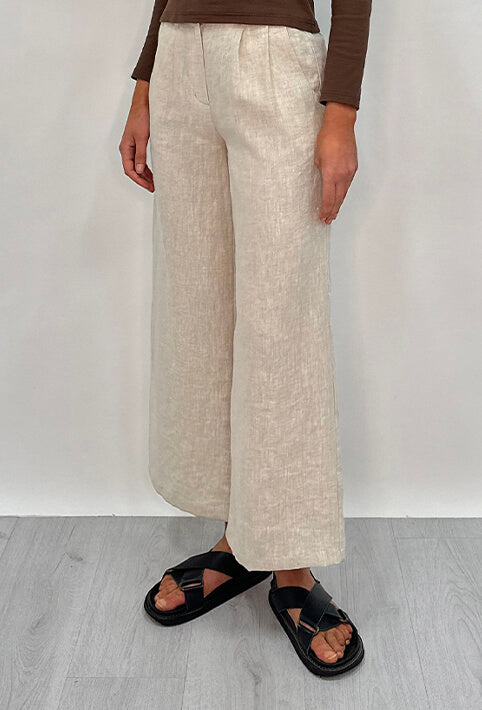 Edith Linen Culottes in beige is 100% Linen with elastic waistband at back, only slightly cropped, button and zip enclosure at front and 2 side pockets