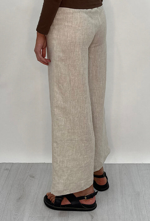 Edith Linen Culottes in beige is 100% Linen with elastic waistband at back, only slightly cropped, button and zip enclosure at front and 2 side pockets