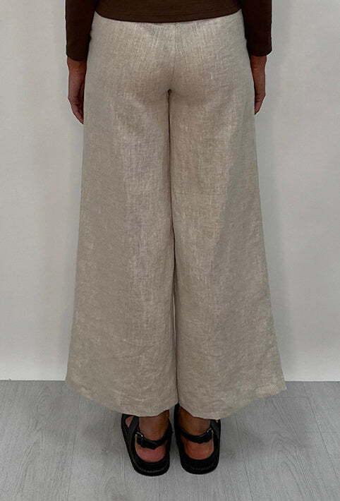 Edith Linen Culottes in beige is 100% Linen with elastic waistband at back, only slightly cropped, button and zip enclosure at front and 2 side pockets
