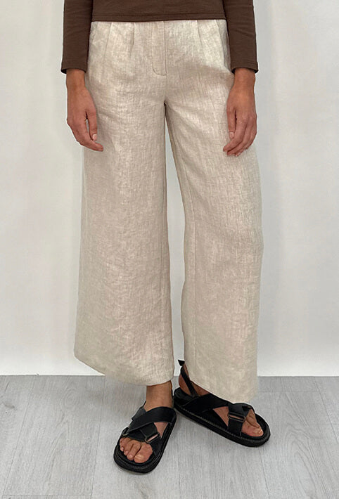 Edith Linen Culottes in beige is 100% Linen with elastic waistband at back, only slightly cropped, button and zip enclosure at front and 2 side pockets