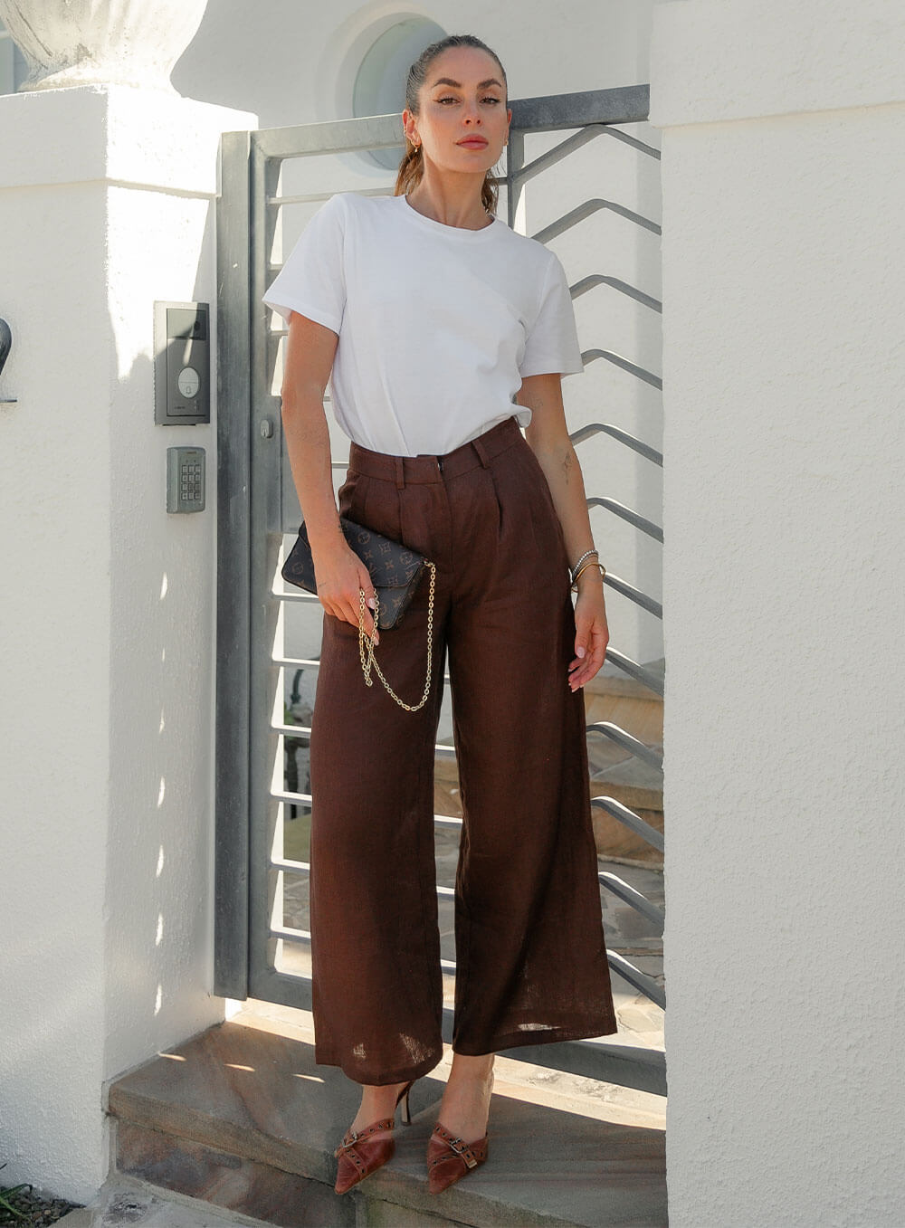 Edith Linen Culottes in chocolate is 100% Linen with elastic waistband at back, only slightly cropped,  button and zip enclosure at front and 2 side pockets