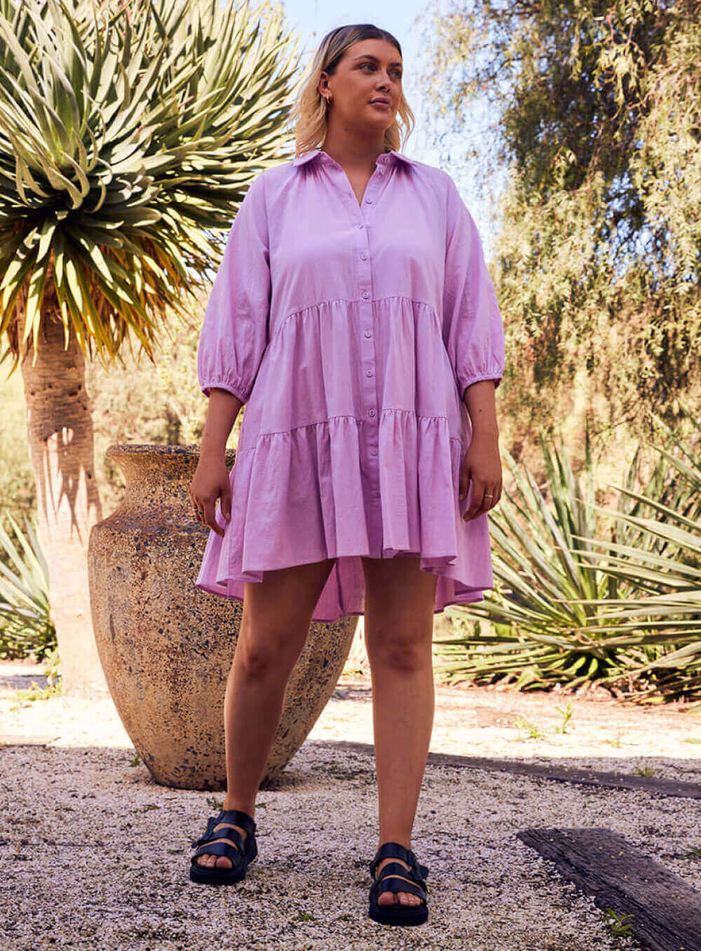The Jasmine dress is an oversize, mini length lilac colour dress with 2 tiers and a 3/4 sleeve with elastic cuff