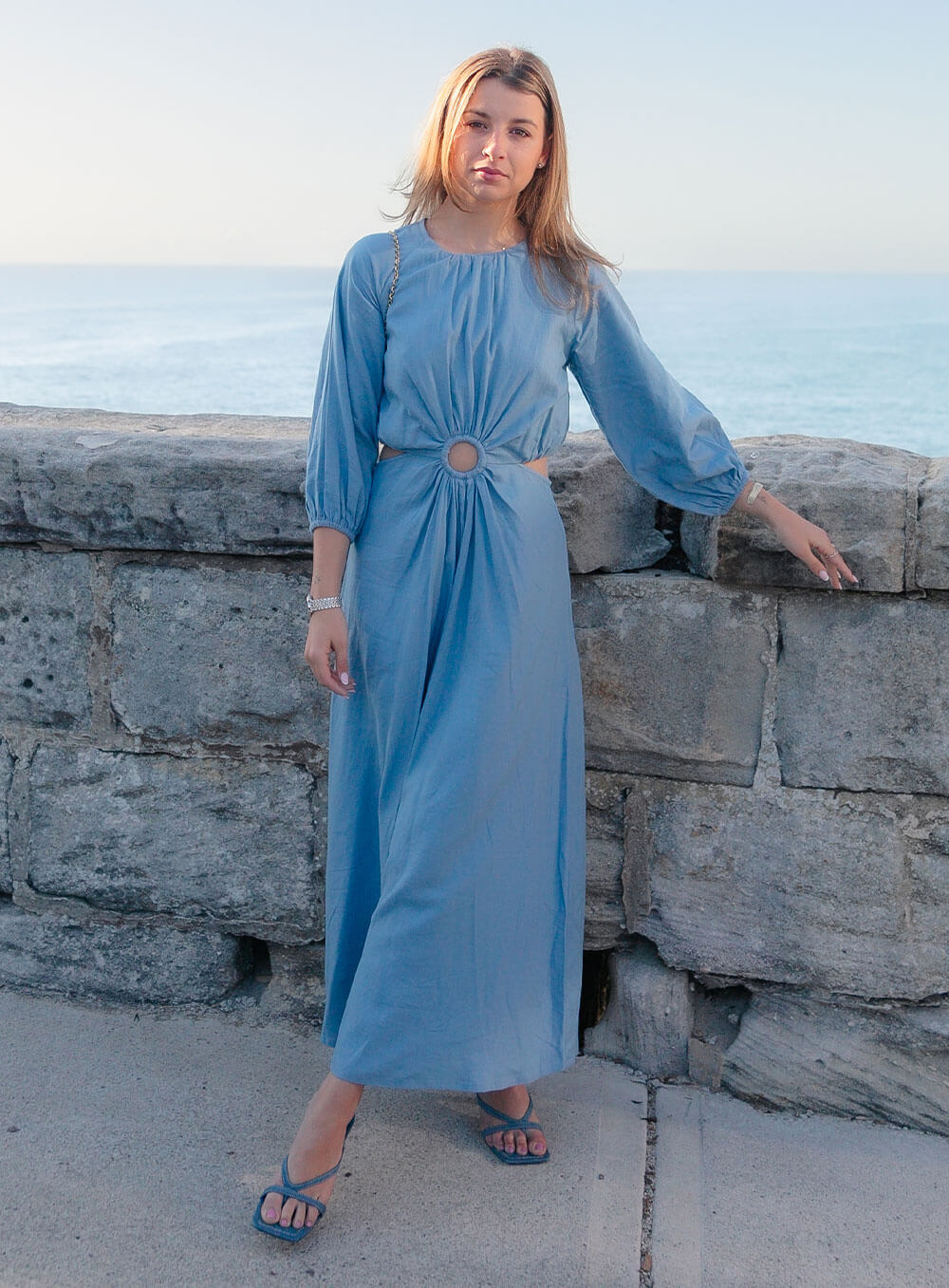The Margot Linen mid length dress in Nightshade features an invisible zip in centre back, strategically placed side cut outs. Circle detail centre front.