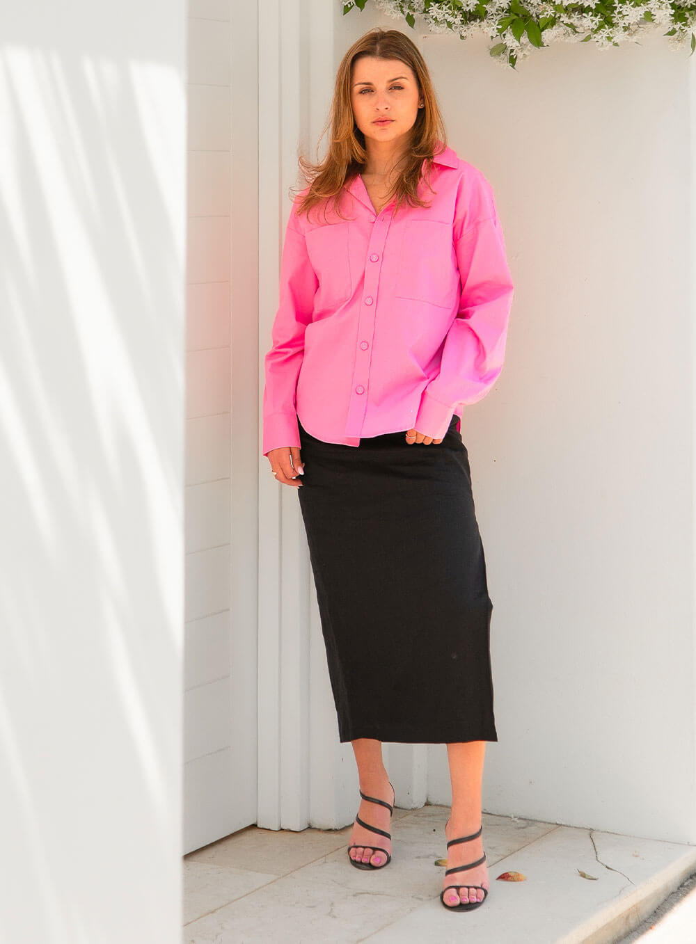 The Sienna Poplin Shirt in pink features button through front, scooped shirt hem style, self fabric covered buttons, luxe soft and breathable cotton poplin base